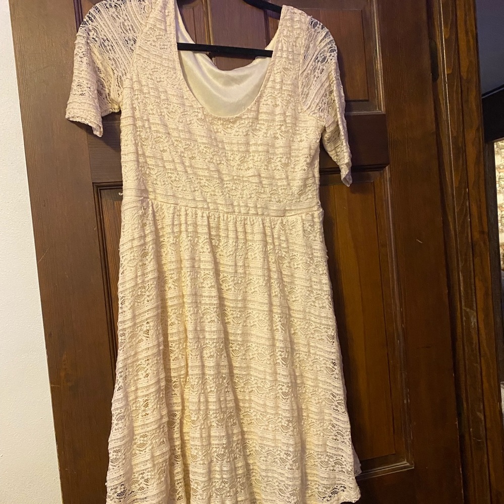 It’s a off white dress that is a size large and have only been worn once